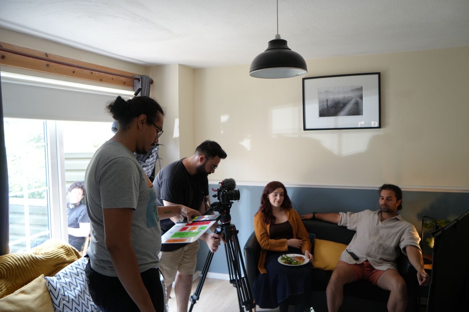 On set, The Last Entry — camera and slate